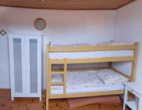 a bedroom with a wooden door
